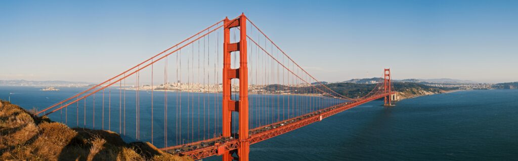 Scenic view of Golden Gate Bridge spanning the blue waters of San Francisco Bay.