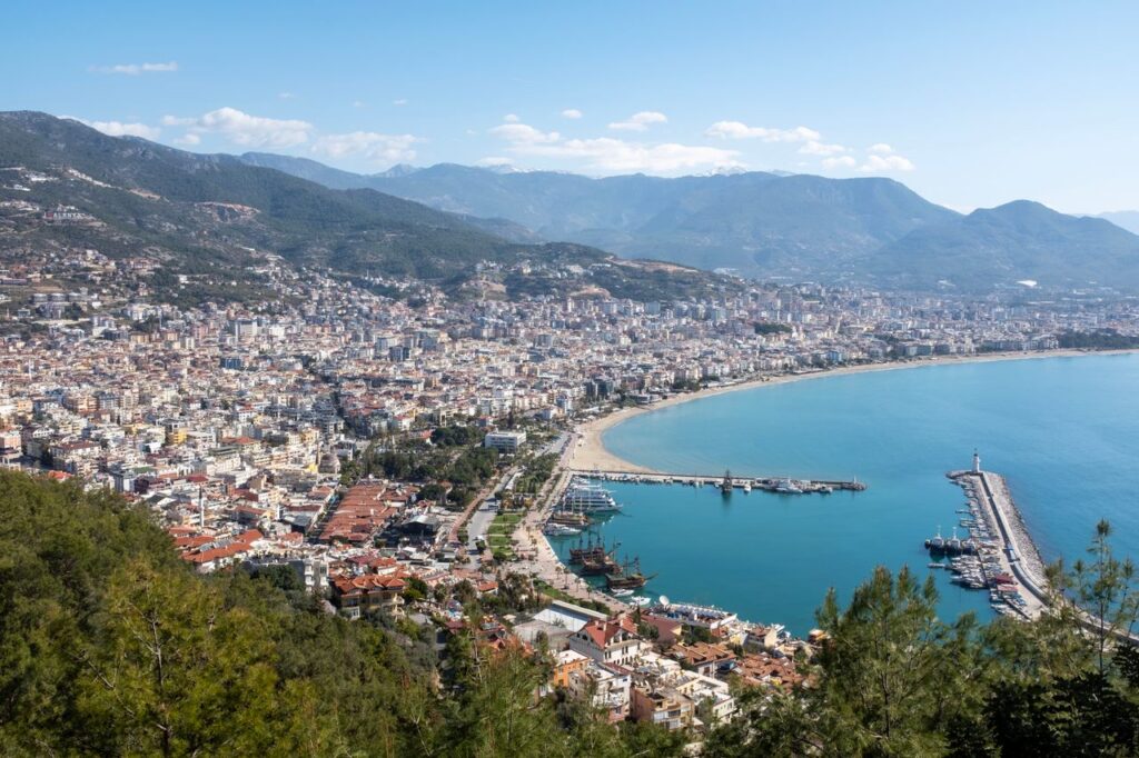 A breathtaking aerial view of Alanya, showcasing its vibrant cityscape and coastline.